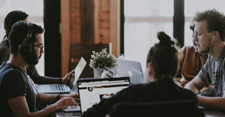 Employees of a service provider working on their SEO and SEA strategy