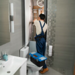 Plumber at work on an installation